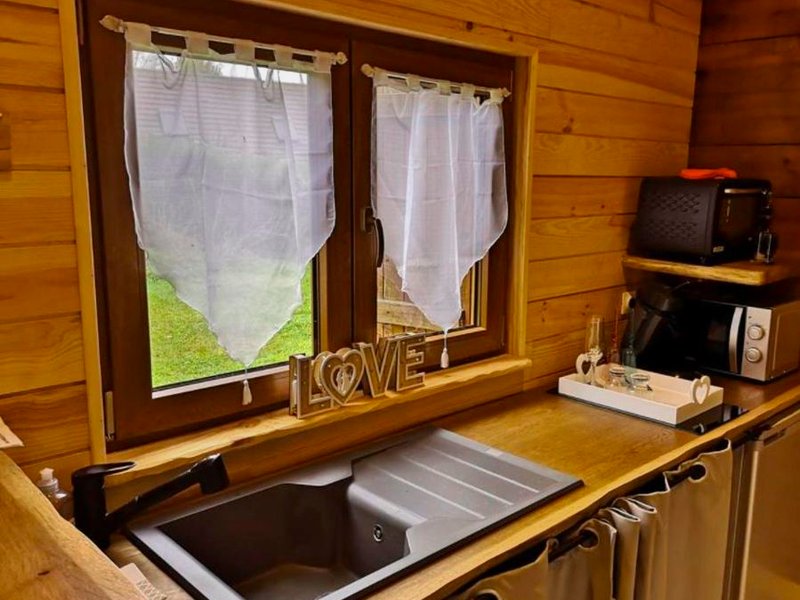 Chalet chaleureux à Louâtre avec piscine partagée (Chalet chaleureux a Louatre avec piscine partagee)の写真