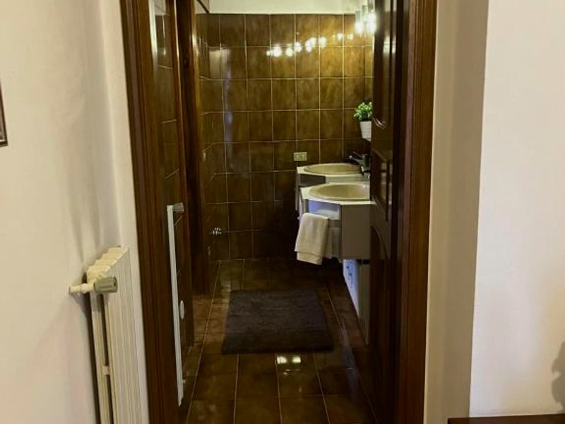 accogliente camera con bagno privatoの写真