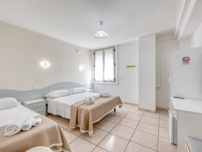 Camere almaredamarra a 50 m dalla spiaggia sabbiosa e 200 m dal centroの写真