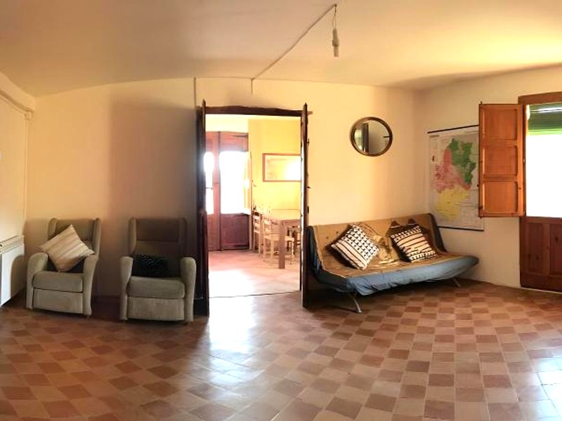［サリーナス デ オス］一軒家（150m²）｜ 2ベッドルーム／1バスルーム (Habitación con salón, terraza y baños privados.)の写真